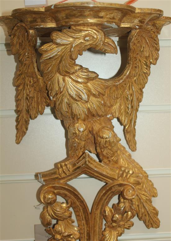 A pair of 19th century carved giltwood wall brackets, 17in.